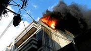 building burning in Homs city - Σόλων ΜΚΟ